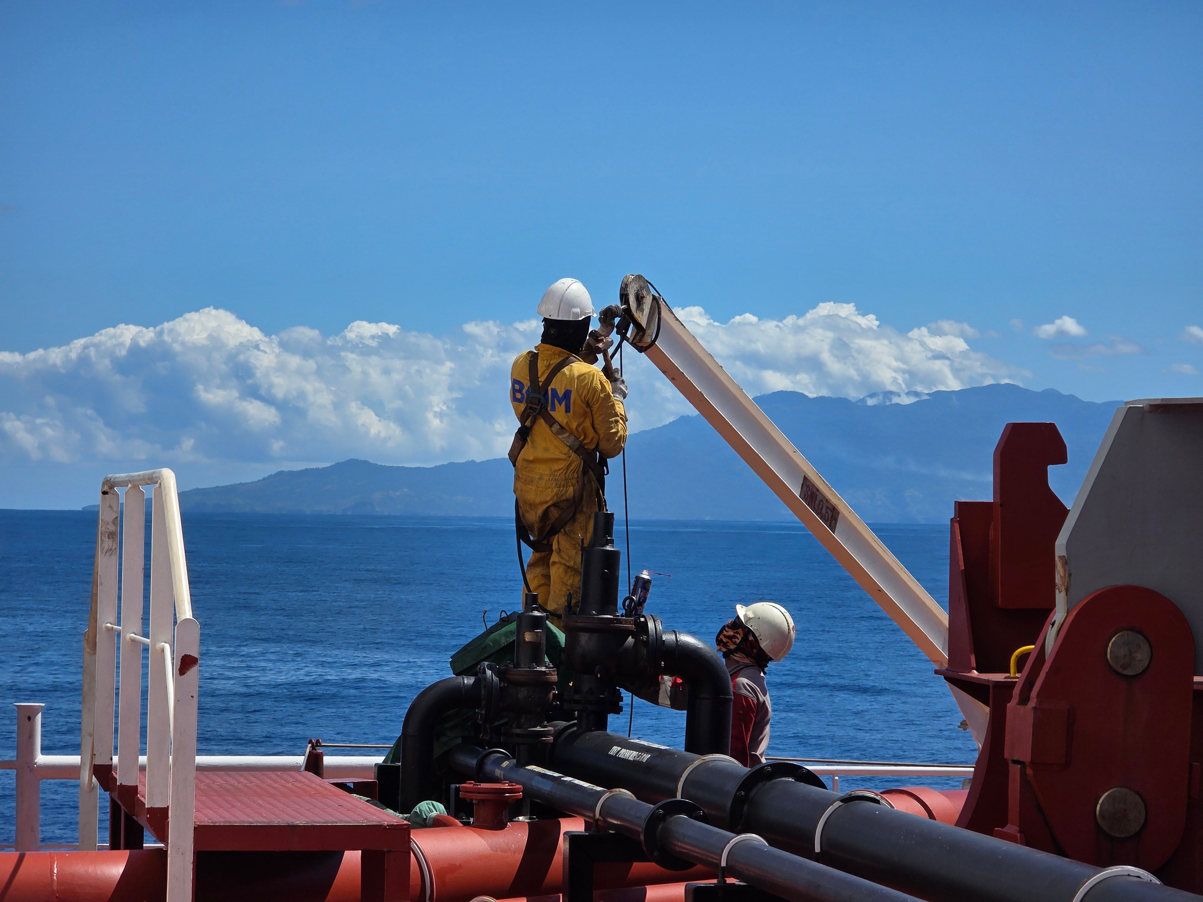 BWZ field engineer inspecting a pipeline valve on site